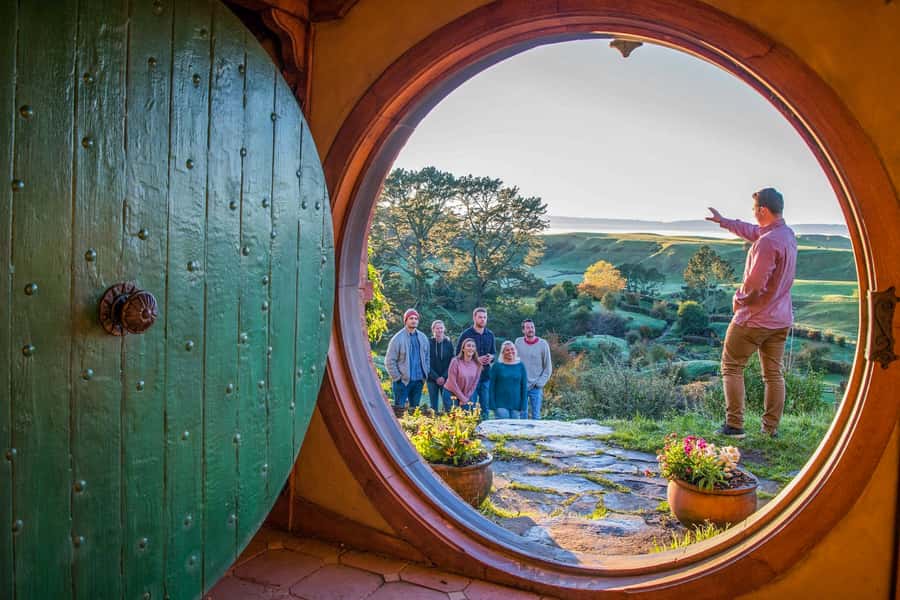 Auckland: Hobbiton Movie Set Day Trip with Festive Lunch - Walking through the Hobbiton Movie Set