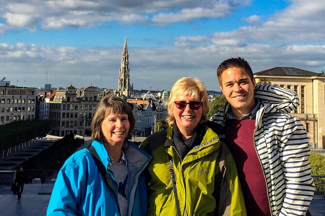 Brussels Private & Personalized Christmas Tour with a Local Guide - The cobbled dining street and Belgian holiday food