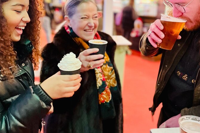 Christmas Lights and Markets Guided Walking Tour with Mulled Wine - Christmas markets, lights, and street performers