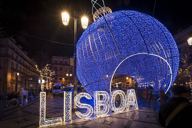 Christmas Lights Lisbon Tour with a Local in Private Eco Tuk Tuk - Baixa: grand streets rebuilt after the 1755 earthquake