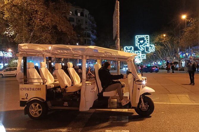 Christmas Lights Tour of Barcelona in Private Eco Tuk Tuk - Rambla de Cataluña and Casa Calvet