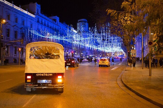 Christmas Lights Tour of Madrid in Eco Tuk Tuk Private - Neptuno, the Prado, and San Jerónimo