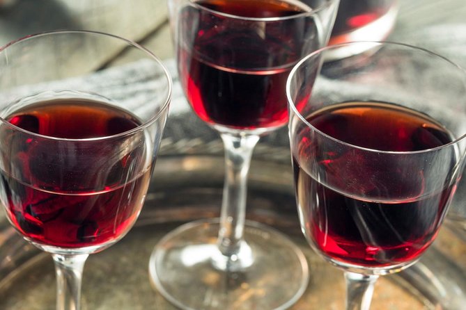 Christmas River Cruise with Typical Cake and Liquor - Passing under the 25th of April Bridge