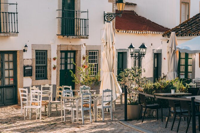 Festive Faro: Historic Christmas Lights & Market Delights - Christmas stalls and lights at Largo da Sé