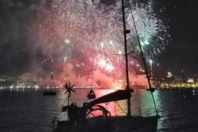 Lisbon: Fireworks, Music and Open Bar in New Year's Eve Cruise - Midnight Fireworks With the City Behind You