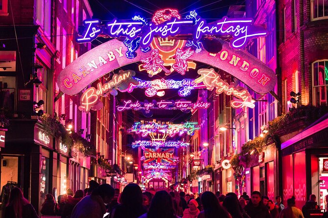 London Christmas Lights Private Walking Tour - Covent Garden: a lively opening among market stalls