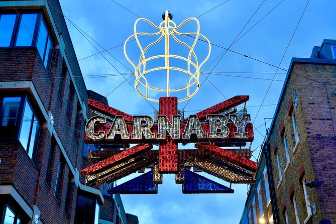 London Exclusive Christmas Lights Guided Tour by Black Cab - Oxford Street: London’s big opening display