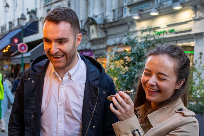 Paris Christmas Food Tour with a Local Guide, and Seasonal Treats - A seated French food stop at Place Saint-André-des-Arts