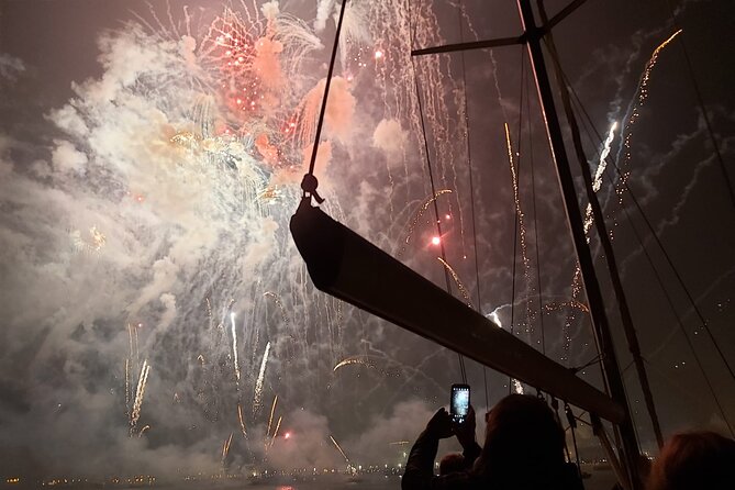 Passing the Year in a Boat with Champagne and Fireworks - Cristo Rei and the Ponte 25 de Abril
