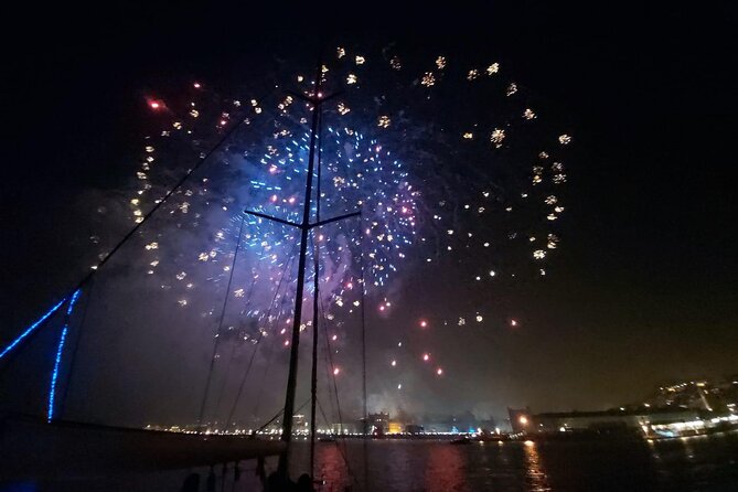 Passing the Year in a Boat with Champagne and Fireworks - Sailing toward Terreiro do Paço