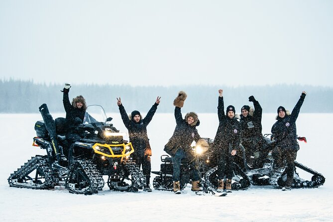Santa Village Tour+Lapland Cuisine In Glass Igloo+Snow Scooters - Snow scooters on a frozen lake