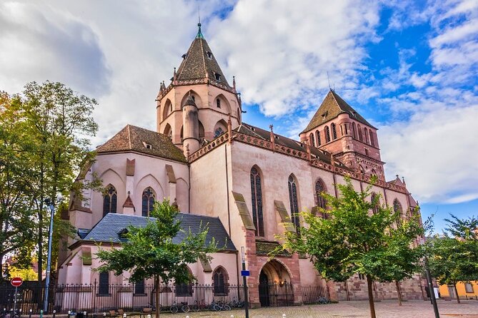 Strasbourg Christmas Magic Self Guided Walking Tour with an APP - Red light curtains, the Capital of Christmas arch, and riverside streets