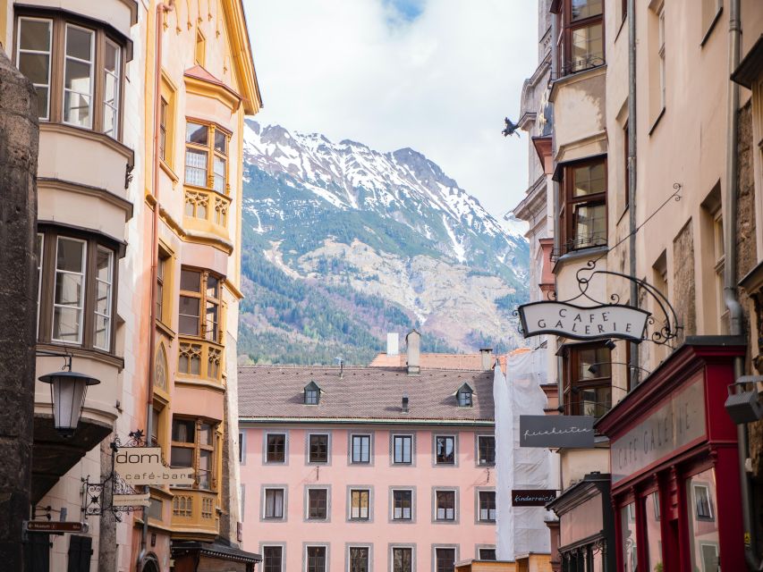 Winter Magic of Innsbruck: Christmas Spirit & Alpine Views - Maria Theresien Straße and the Nordkette backdrop